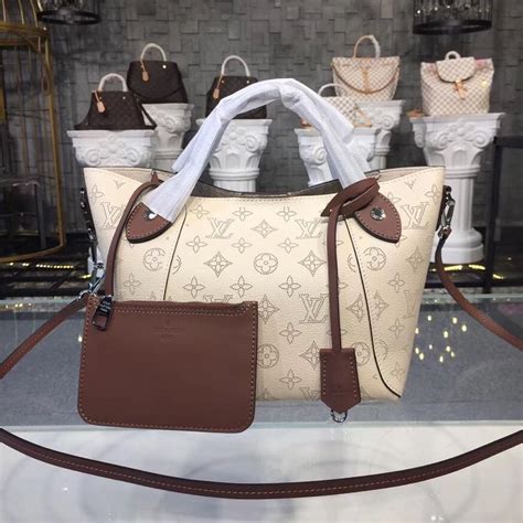 cream color louis vuitton bag|louis vuitton mahina bag price.